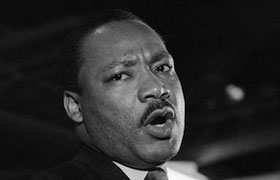 (Original Caption) Caught in a somber mood, Dr. Martin Luther King addresses some 2,000 people on the eve of his death. The former founder and Chairman of the Southern Christian Leadership Conference was slain by an unknown assailant on April 4, 1968.